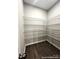 Walk-in pantry with wire shelving and hardwood flooring at 9831 Quercus Ln, Huntersville, NC 28078