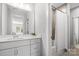 Clean bathroom with white vanity and shower/tub combo at 11112 Benjamin Smith Ave, Huntersville, NC 28078