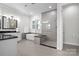 Spa-like bathroom with a soaking tub, walk-in shower, and double vanity at 11112 Benjamin Smith Ave, Huntersville, NC 28078