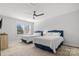 Bright bedroom with two twin beds and plenty of natural light at 11112 Benjamin Smith Ave, Huntersville, NC 28078