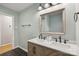 Stylish bathroom features a double sink vanity, hexagon tile floor, and modern finishes at 132 30Th Nw Ave, Hickory, NC 28601