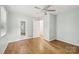 Light and airy bedroom featuring hardwood floors and convenient en-suite bathroom access at 132 30Th Nw Ave, Hickory, NC 28601