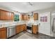 Bright kitchen boasts stainless steel appliances, granite countertops, and a view of the backyard at 132 30Th Nw Ave, Hickory, NC 28601