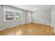 Inviting living room with hardwood floors, a large window, and neutral walls at 132 30Th Nw Ave, Hickory, NC 28601