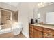 Clean bathroom with shower, toilet and vanity with granite top at 157 Highland Forest Dr, Clover, SC 29710