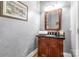Small bathroom with dark vanity and granite countertop at 157 Highland Forest Dr, Clover, SC 29710