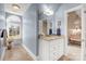 Simple bathroom with vanity and arched window at 157 Highland Forest Dr, Clover, SC 29710