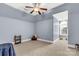 Bright bedroom featuring a large window and ceiling fan at 157 Highland Forest Dr, Clover, SC 29710