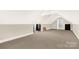 Spacious bonus room with neutral walls and carpet at 157 Highland Forest Dr, Clover, SC 29710