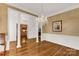 Bright dining room with hardwood floors and chandelier at 157 Highland Forest Dr, Clover, SC 29710