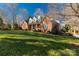 Brick house with large front yard and mature trees at 157 Highland Forest Dr, Clover, SC 29710