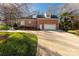 Brick home with attached garage and driveway at 157 Highland Forest Dr, Clover, SC 29710
