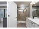 Bathroom with shower and double vanity at 18106 Pear Hawthorne Dr, Huntersville, NC 28078
