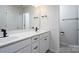 Double vanity bathroom with modern fixtures at 18106 Pear Hawthorne Dr, Huntersville, NC 28078