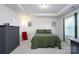 Cozy bedroom with double bed and dresser at 18106 Pear Hawthorne Dr, Huntersville, NC 28078