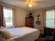 Bedroom with a queen bed and ceiling fan at 1916 Elmwood Dr, Gastonia, NC 28054