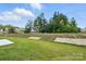Serene backyard view with lush greenery and landscaping, offering a peaceful outdoor setting at 2024 Embassy Ct # 49, Charlotte, NC 28213