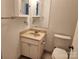 Simple bathroom with vanity and toilet at 3508 Colony Rd # H, Charlotte, NC 28211