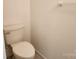 Clean bathroom with toilet and neutral colored walls at 3508 Colony Rd # H, Charlotte, NC 28211