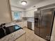 Modern kitchen featuring stainless steel appliances and granite countertops at 3508 Colony Rd # H, Charlotte, NC 28211