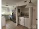 Convenient laundry area with washer and dryer in the kitchen at 3508 Colony Rd # H, Charlotte, NC 28211