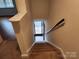 Staircase leading to lower level, carpeted steps at 3508 Colony Rd # H, Charlotte, NC 28211