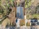 Aerial view showing house, driveway, and surrounding trees at 506 Broadway Ct # 9, Statesville, NC 28677