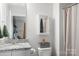 Clean bathroom, granite countertop, and shower at 506 Broadway Ct # 9, Statesville, NC 28677