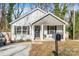 Newly built home with a two-car driveway and mailbox at 506 Broadway Ct # 9, Statesville, NC 28677