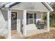 Front porch with grill and welcoming decor at 506 Broadway Ct # 9, Statesville, NC 28677
