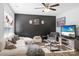 Bright living room with comfortable seating and large TV at 506 Broadway Ct # 9, Statesville, NC 28677