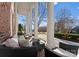 Elegant home with a spacious front porch and white columns at 5401 Sunningdale Dr, Charlotte, NC 28277