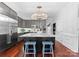 Modern kitchen with stainless steel appliances and an island at 5401 Sunningdale Dr, Charlotte, NC 28277