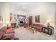Living room with fireplace and comfortable plaid sofas at 5550 Monticello Nw Dr, Concord, NC 28027