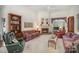 Spacious living room with fireplace and comfortable seating at 5550 Monticello Nw Dr, Concord, NC 28027