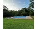 Inviting in-ground pool, perfect for summer fun at 6200 George Hildebran School Rd, Hickory, NC 28602