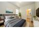 Comfortable bedroom featuring a plush bed, bedside tables, and a serene atmosphere at 7542 Waverly Walk Ave # 7542, Charlotte, NC 28277