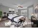 Features large windows, and neutral tones at 8702 Wood Sorrel Ct, Matthews, NC 28105
