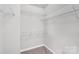 The walk-in closet features adjustable wire shelving for organized storage space at 8702 Wood Sorrel Ct, Matthews, NC 28105