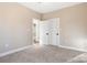 Spacious bedroom with access to bathroom and closets at 9181 Cherokee Dr, Hickory, NC 28601