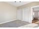 Bright bedroom with double closets and access to hallway at 9181 Cherokee Dr, Hickory, NC 28601