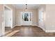 Bright entryway with light hardwood floors and access to other rooms at 9181 Cherokee Dr, Hickory, NC 28601