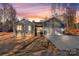 Newly constructed home with gray siding, two-car garage, and landscaped yard at 9181 Cherokee Dr, Hickory, NC 28601