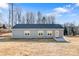 Gray house exterior with backyard and patio at 9181 Cherokee Dr, Hickory, NC 28601