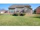 Spacious backyard with large deck and grassy area at 9729 Capella Nw Ave, Concord, NC 28027