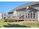 Home features a deck and spacious backyard at 9729 Capella Nw Ave, Concord, NC 28027