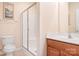 Bathroom with shower and wood vanity at 9729 Capella Nw Ave, Concord, NC 28027