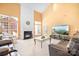 Living room with fireplace, large TV, and comfortable seating at 9729 Capella Nw Ave, Concord, NC 28027