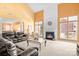 Spacious living room featuring a fireplace and large windows at 9729 Capella Nw Ave, Concord, NC 28027