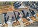 Aerial view of houses with driveways and street at 1025 Lake Como Dr, Monroe, NC 28110